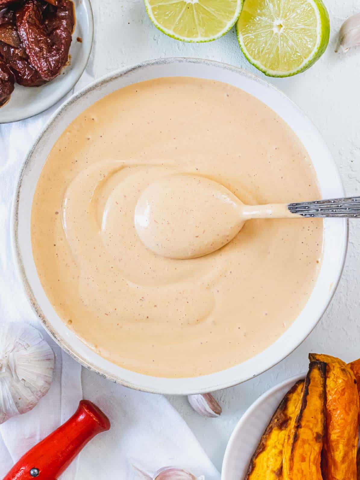 Chipotle sauce in a bowl with a spoon