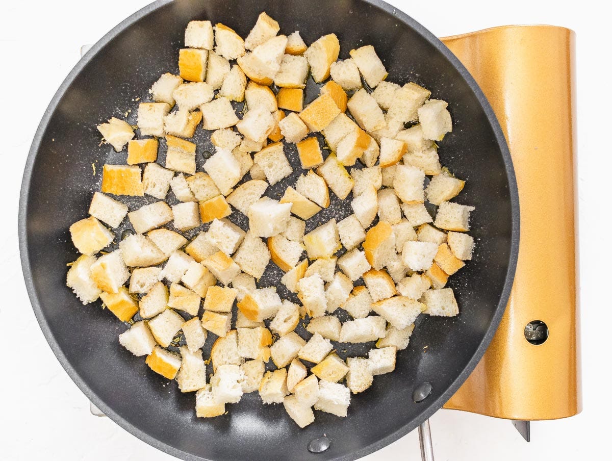 cubed bread into the pan
