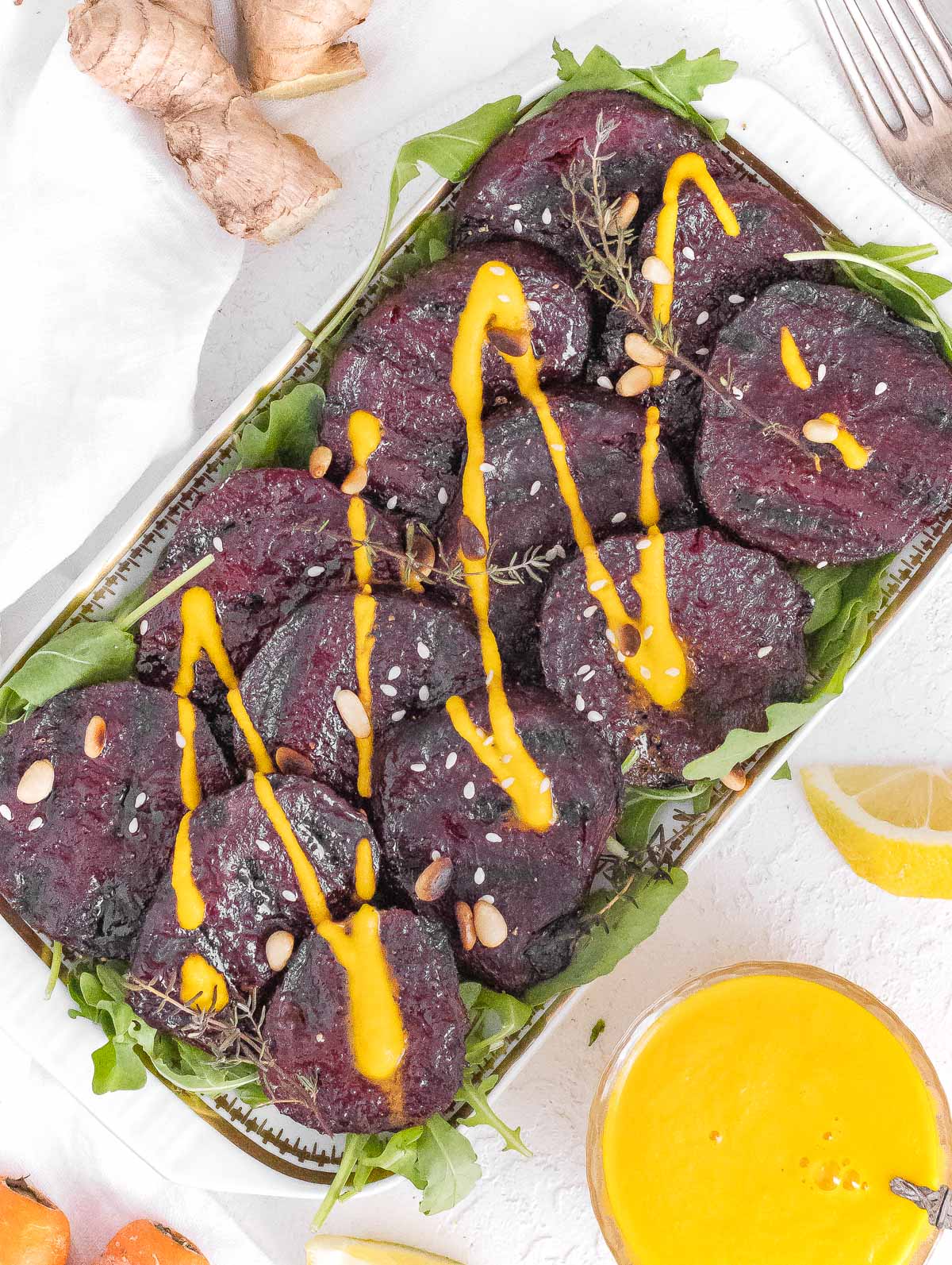 Grilled beets with carrot ginger dressing.