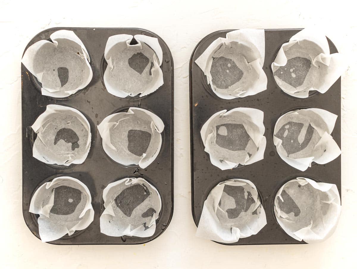 muffin tin lined with parchment paper