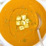 Creamy Mediterranean eggplant soup served in a bowl with olive oil drizzle and feta.