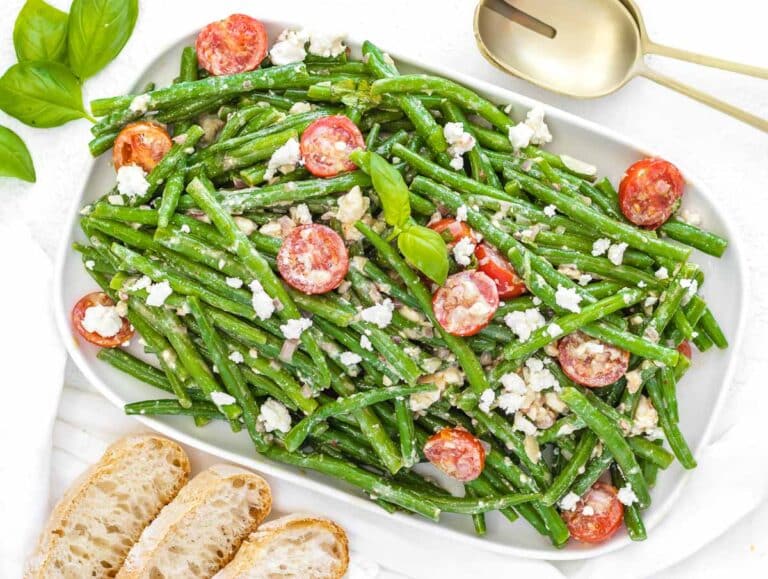 green bean salad with creamy mustard dressing and tomatoes
