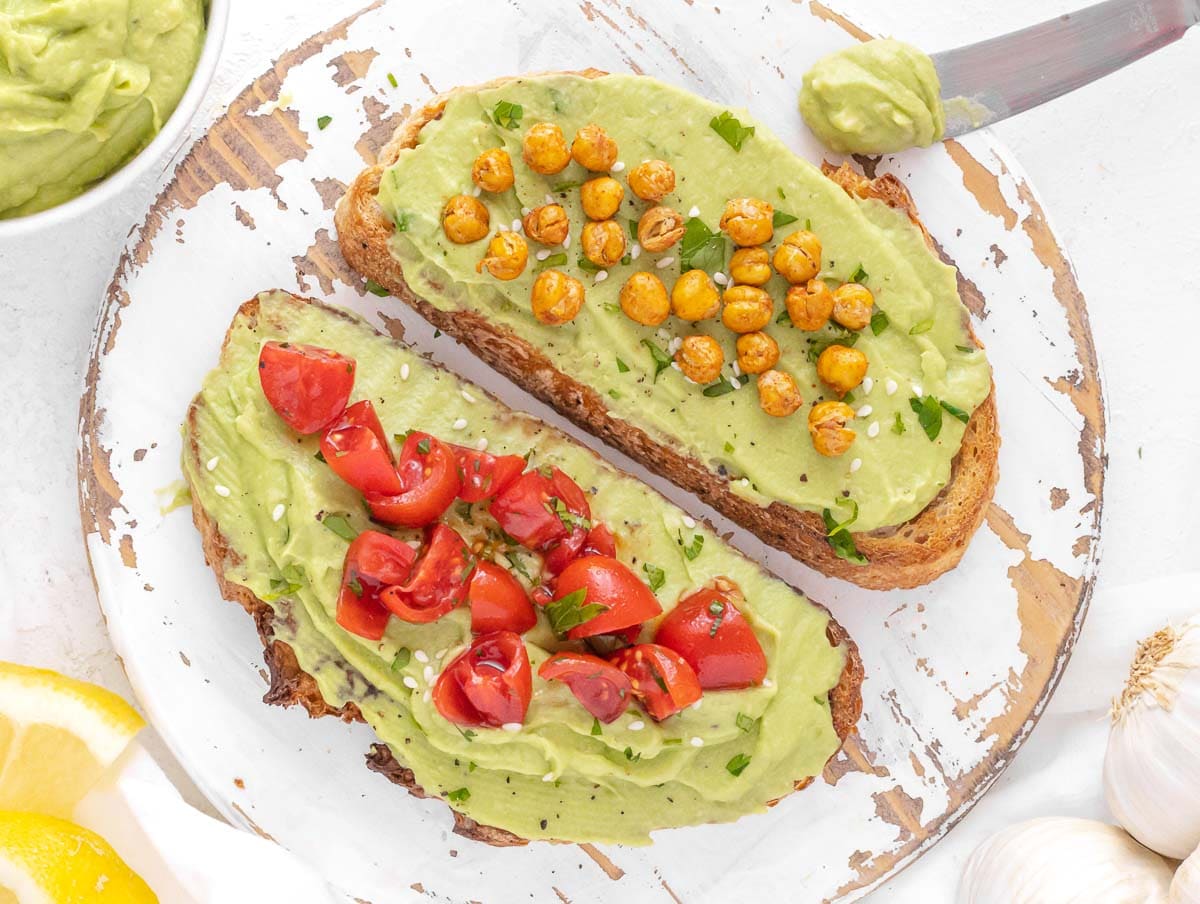 roasted chickpeas on toasted bread with avocado spread
