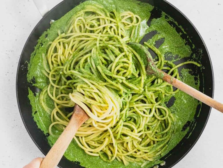 Spinach pesto in a pan with pasta