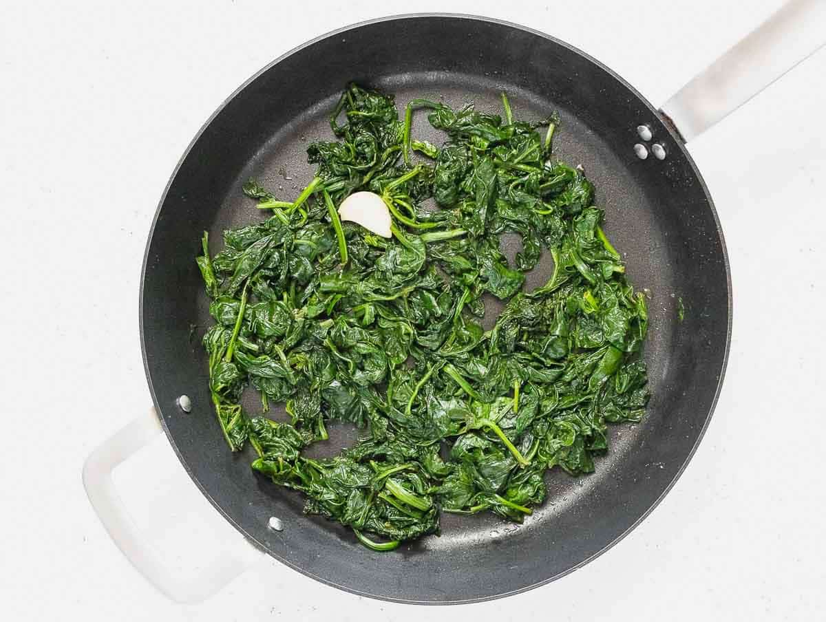 Spinach sauteed in a pan