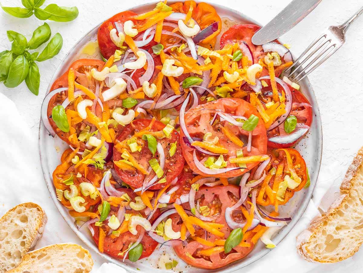 Italian tomato salad with onion, celery, and carrot.