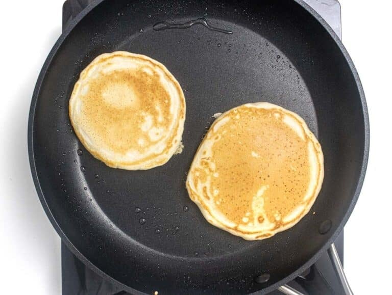flipped vegan pancakes on a pan