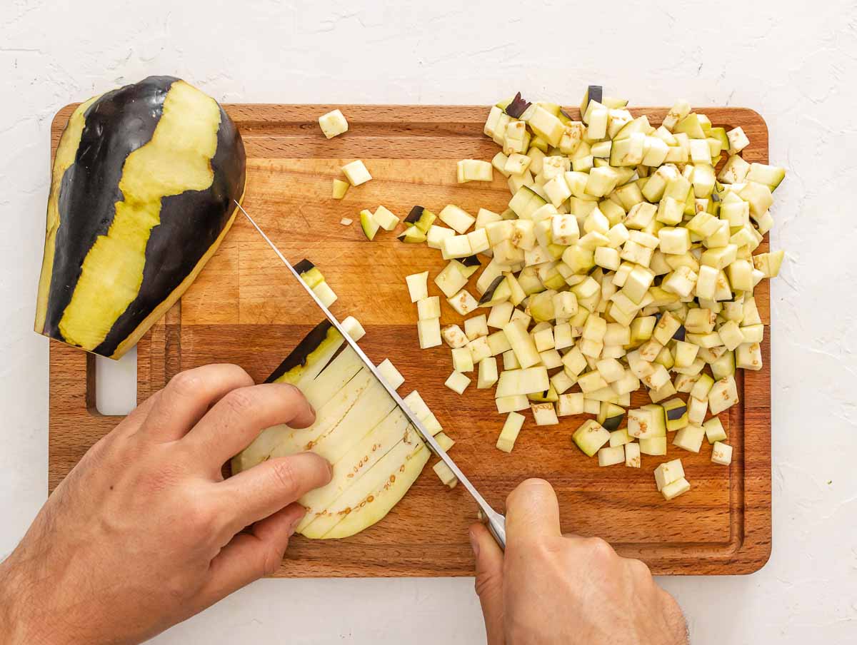 chopping eggplant into 1/4 inch dice