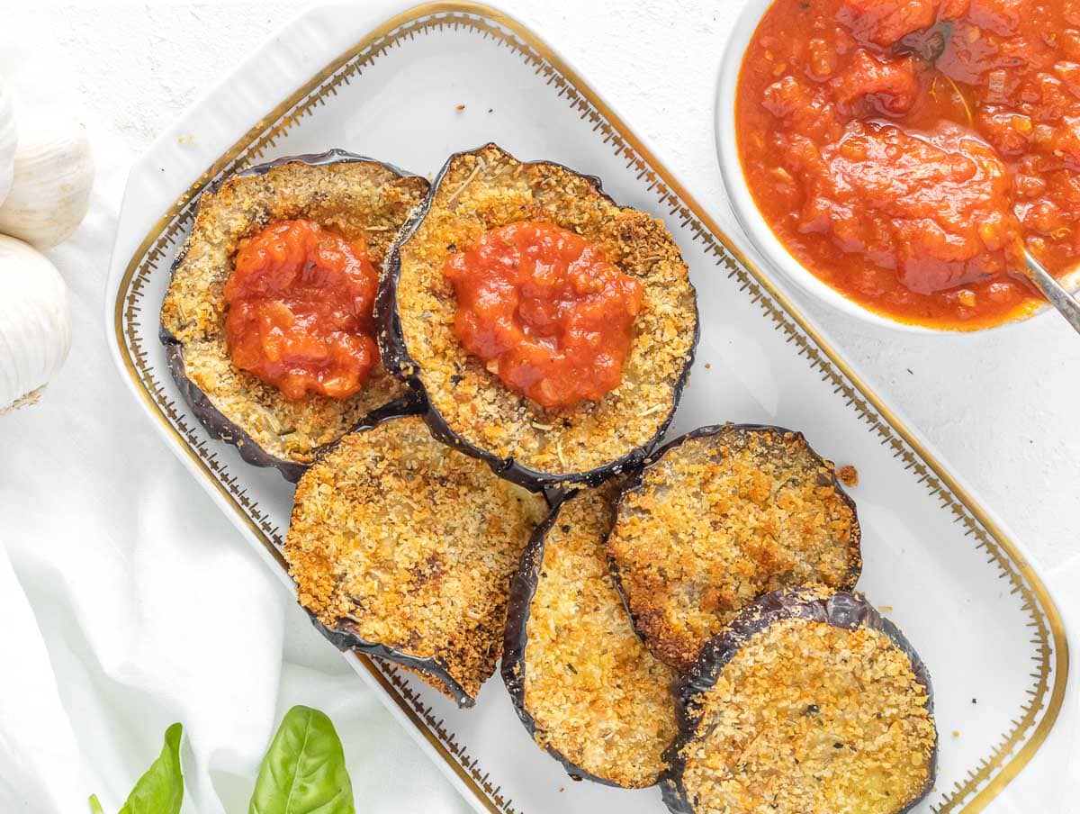 breaded eggplants topped with marinara sauce