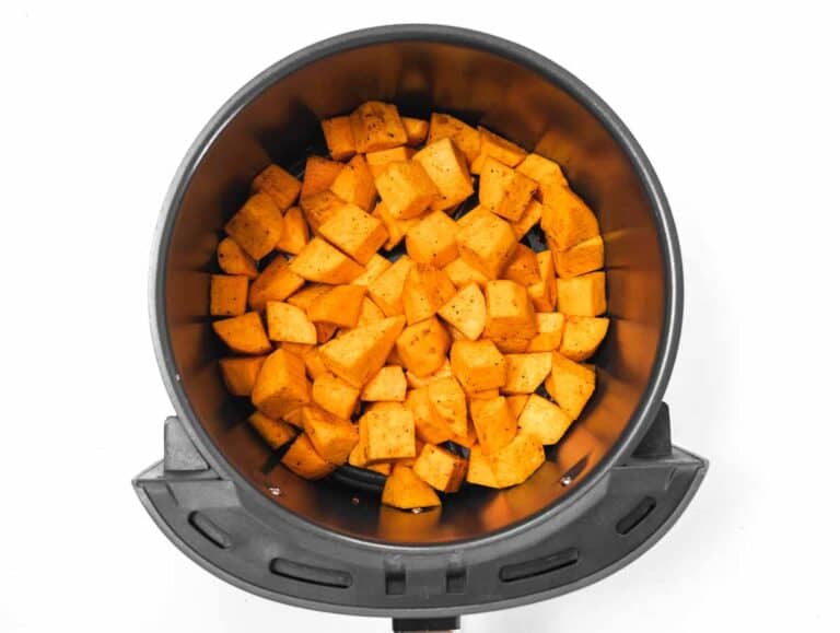 sweet potato cubes in air fryer basket