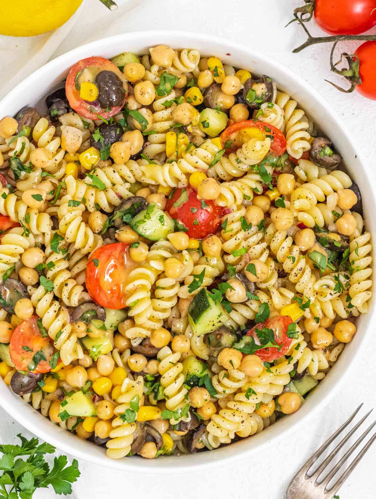 chickpea pasta salad in a large serving bowl