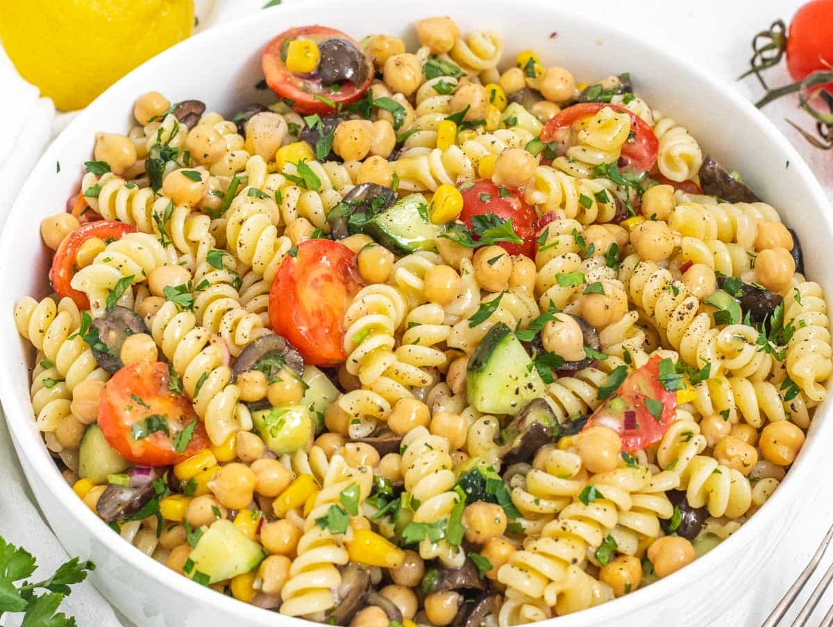 Chickpea pasta salad in a white bowl