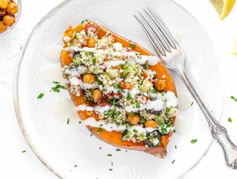 microwave sweet potato loaded with couscous and tahini sauce