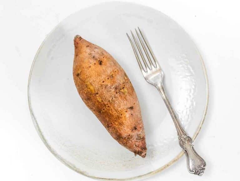 pricked sweet potato with a fork