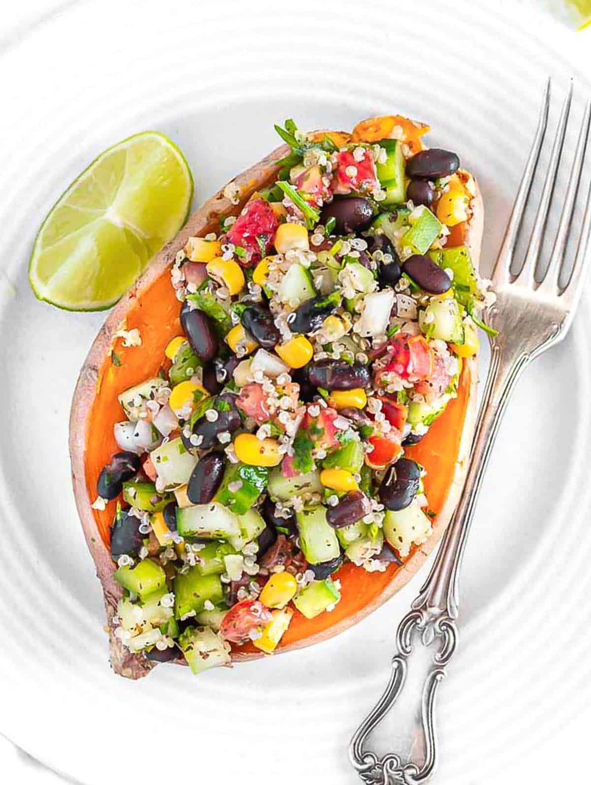 Microwave sweet potato with black bean topping