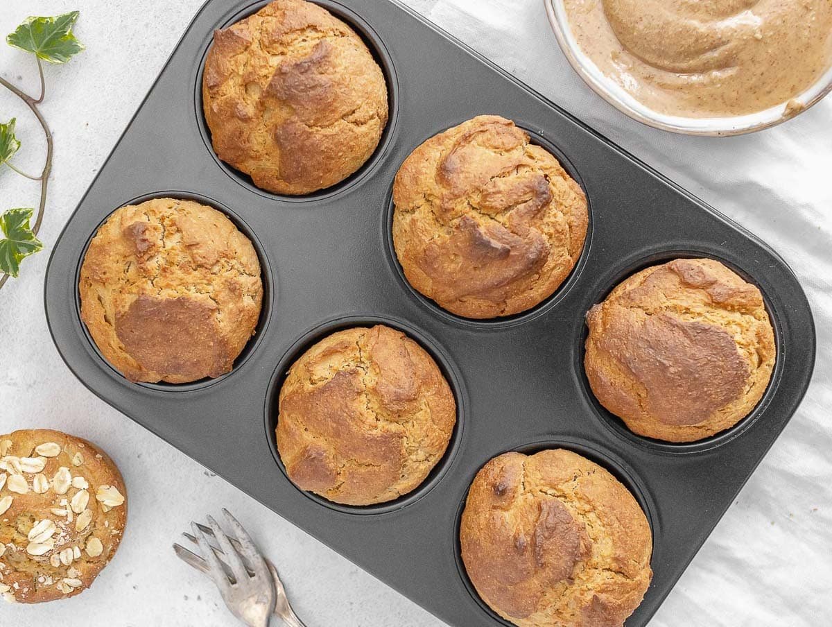 Oat flour muffins in a muffin pan