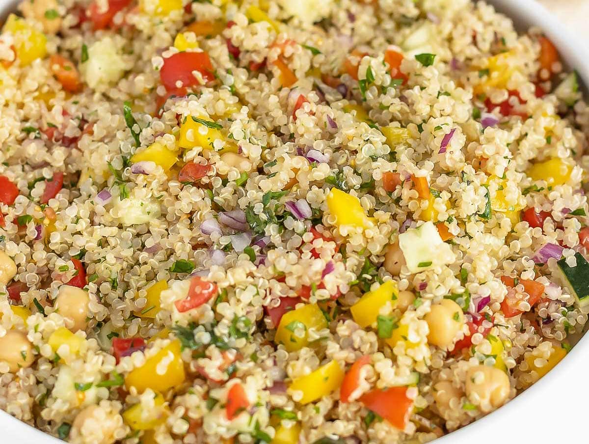 Quinoa salad in a white bowl is one of our best salad recipes