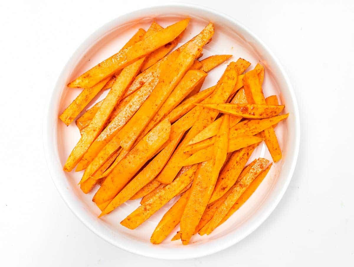 sweet potato fries tossed in oil