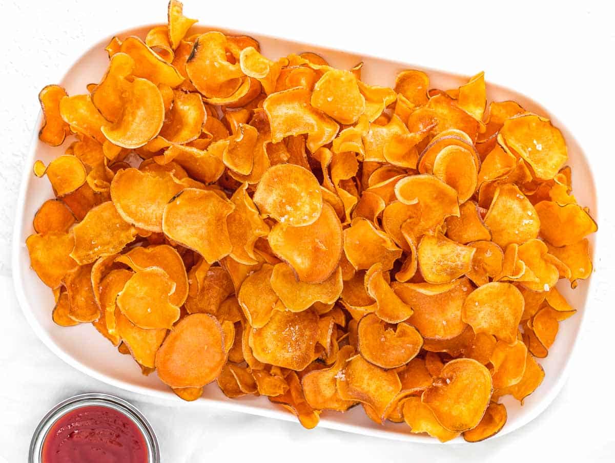 crispy sweet potato chips on a platter