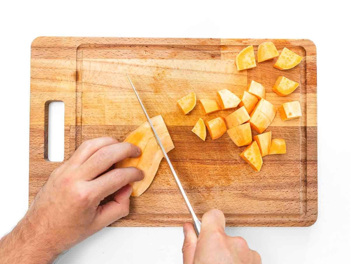 cutting sweet potatoes into dice
