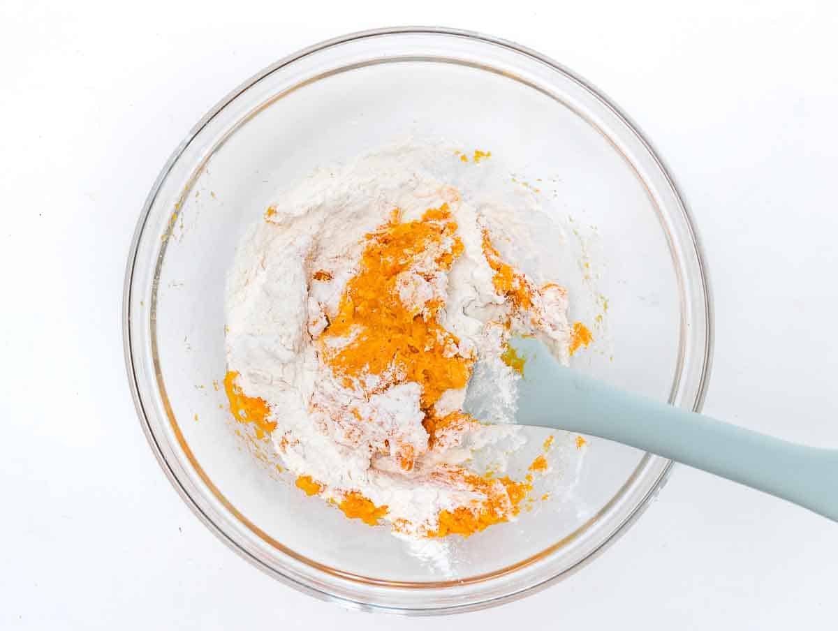 mixing flower and mashed sweet potato 