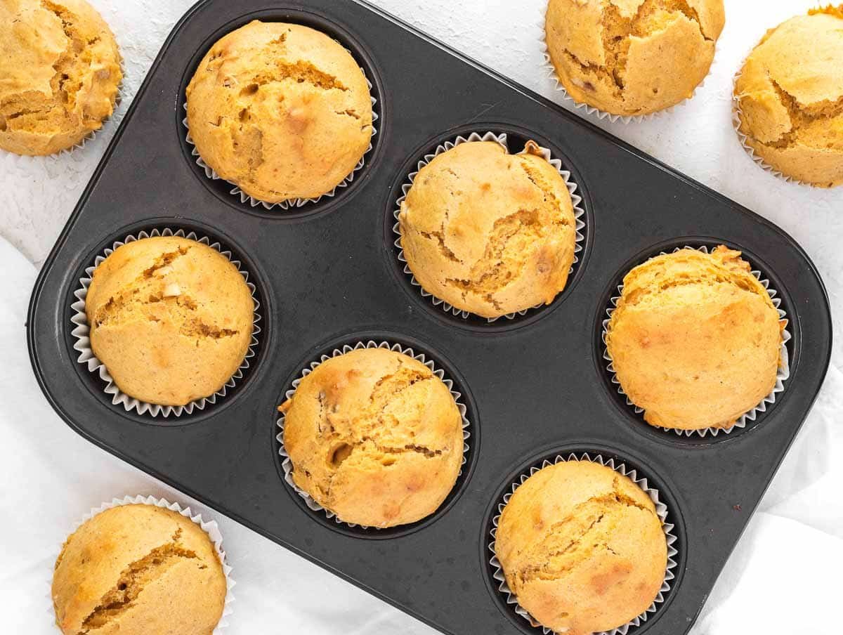 baked sweet potato muffins in a muffin tin