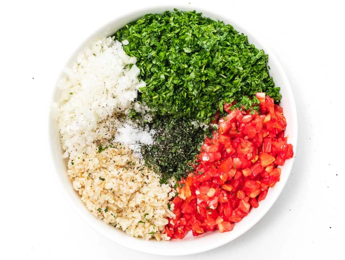 ingredients for tabbouleh recipe in a large bowl