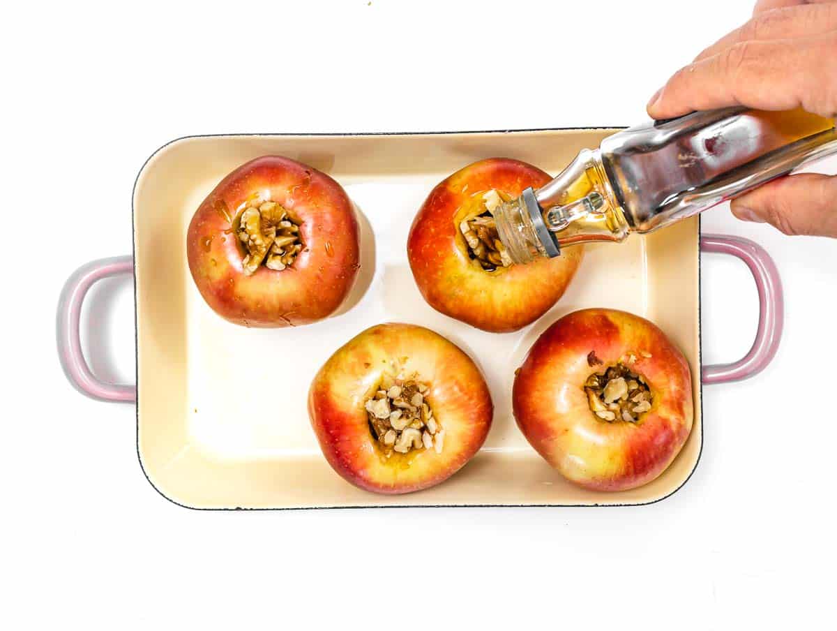 Apples on a tray with walnuts