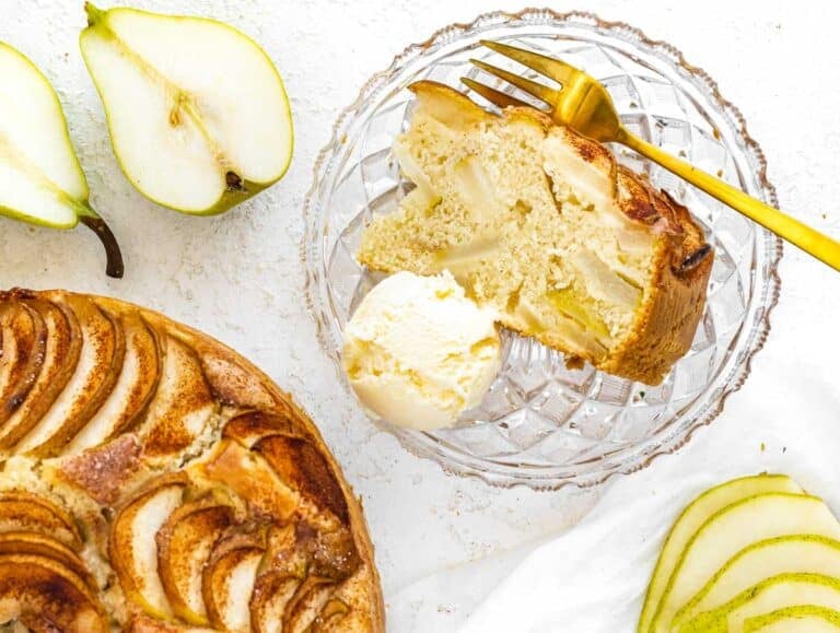 Pear cake on a plate with ice cream