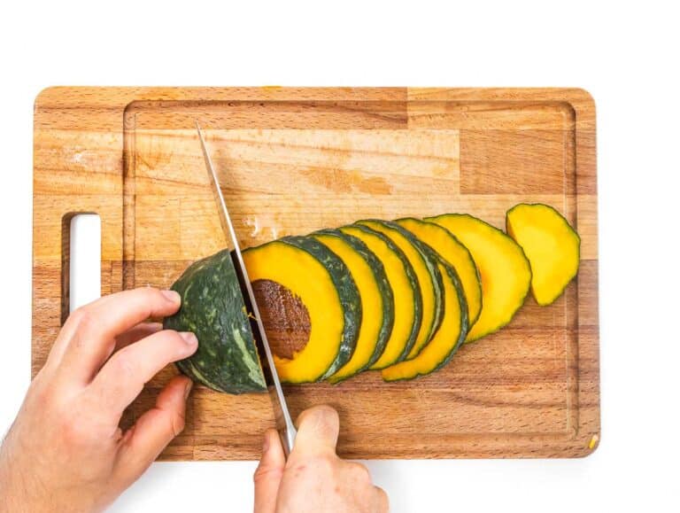 Acorn squash on a cutting board