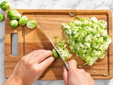 Step 1 Brussels sprouts trimmed and cleaned then thinly sliced.