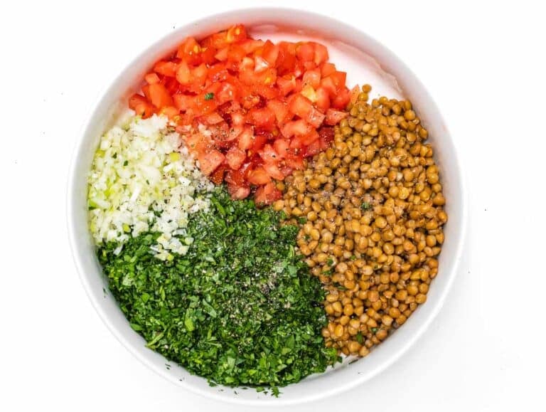 mixing bowl with lentil tabbouleh ingredients