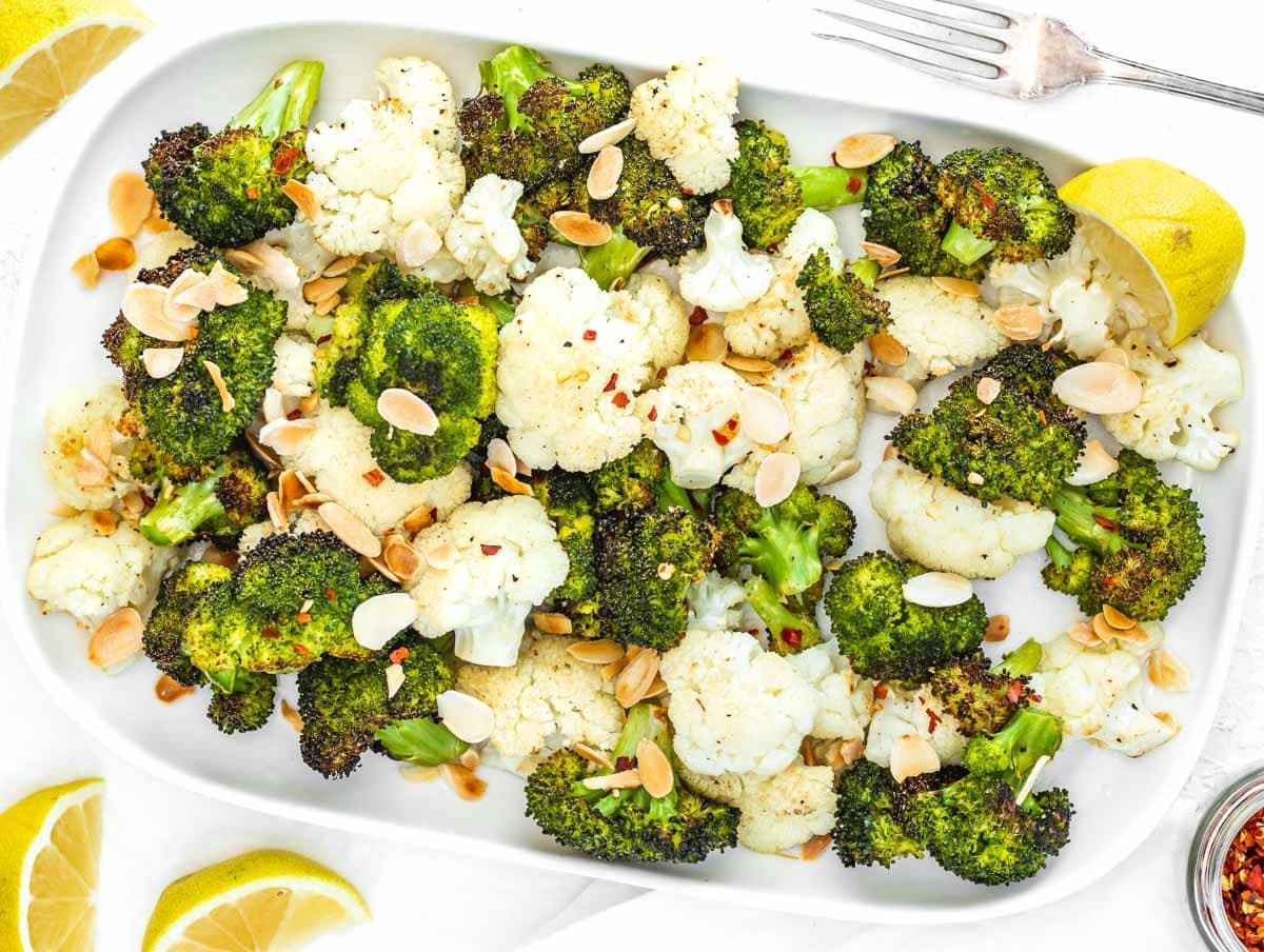 roasted broccoli and cauliflower with almonds on top