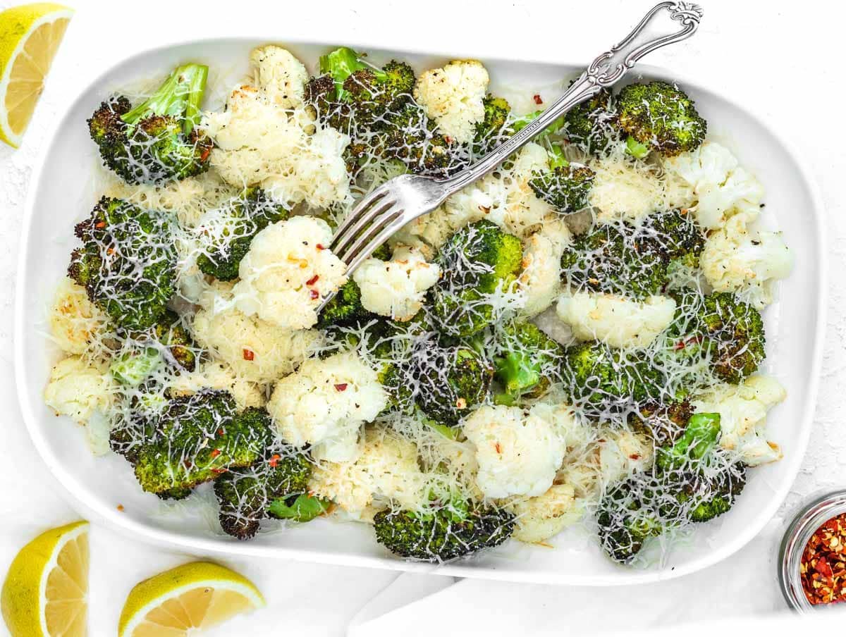 roasted broccoli and cauliflower with cheese on top