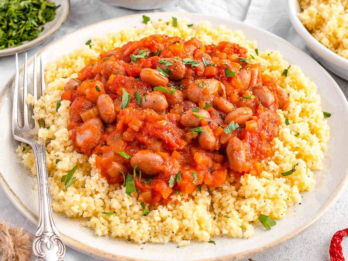 Bean stew with couscous and fork
