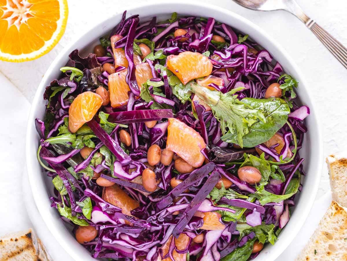 red cabbage and orange in a bowl