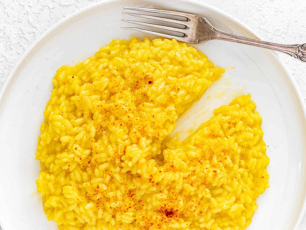 Saffron risotto on a white plate