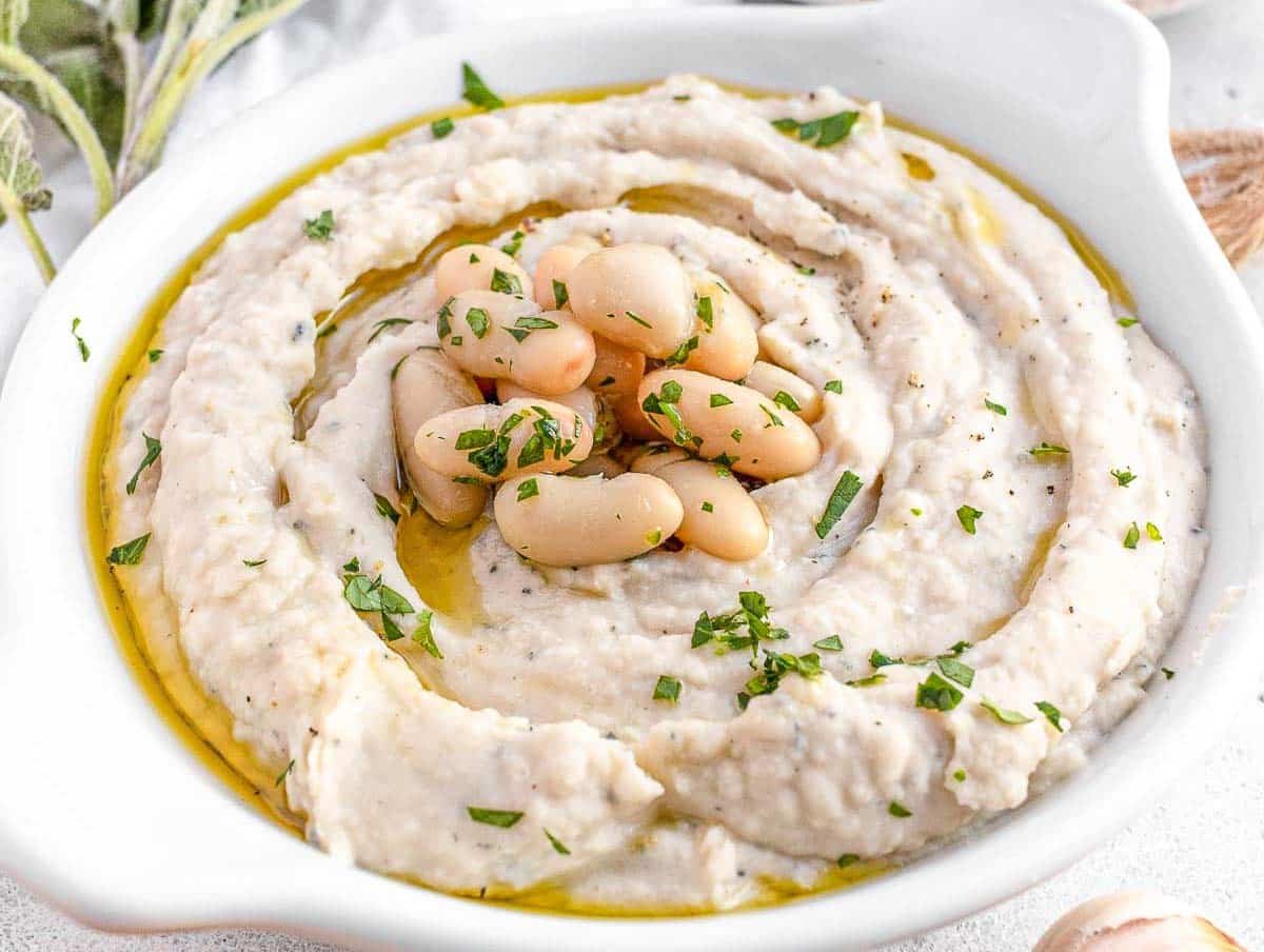 bean dip in a white bowl