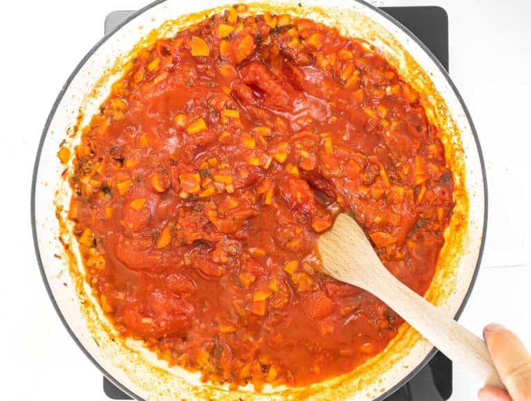 canned tomatoes mashed with a fork