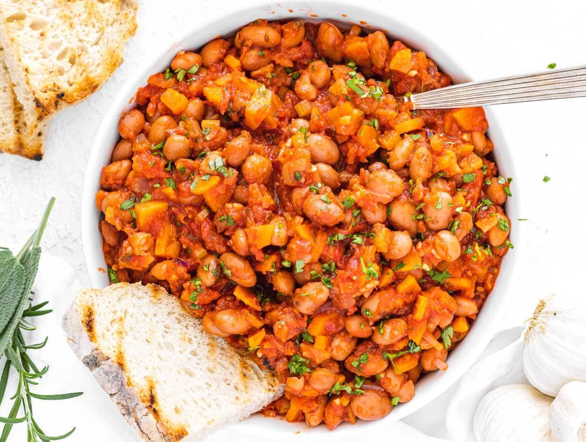 bean stew with spoon and bread