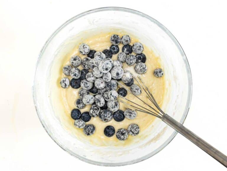 blueberries in batter with flour