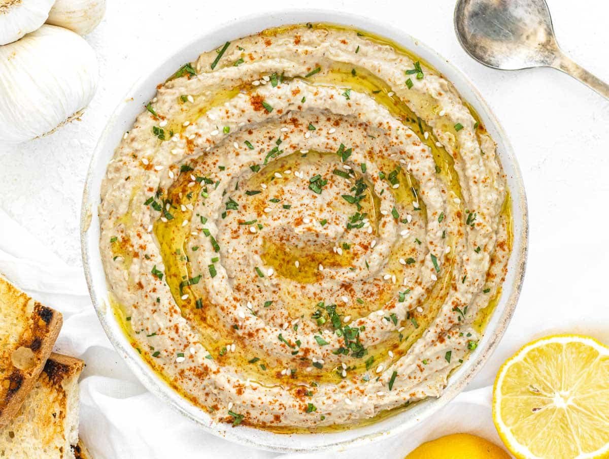 lentil hummus in a bowl with bread
