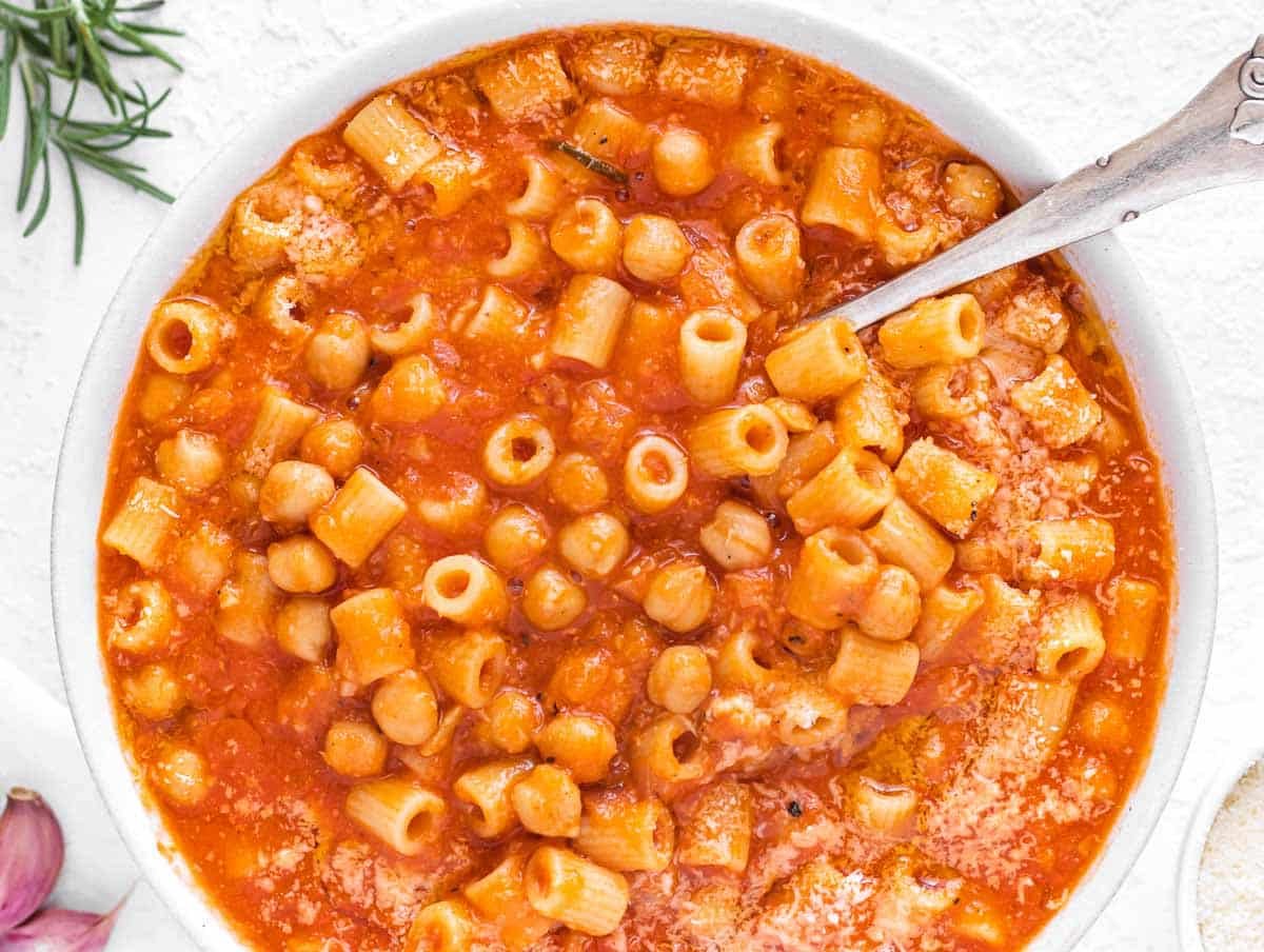 pasta e ceci in a bowl with parmesan cheese