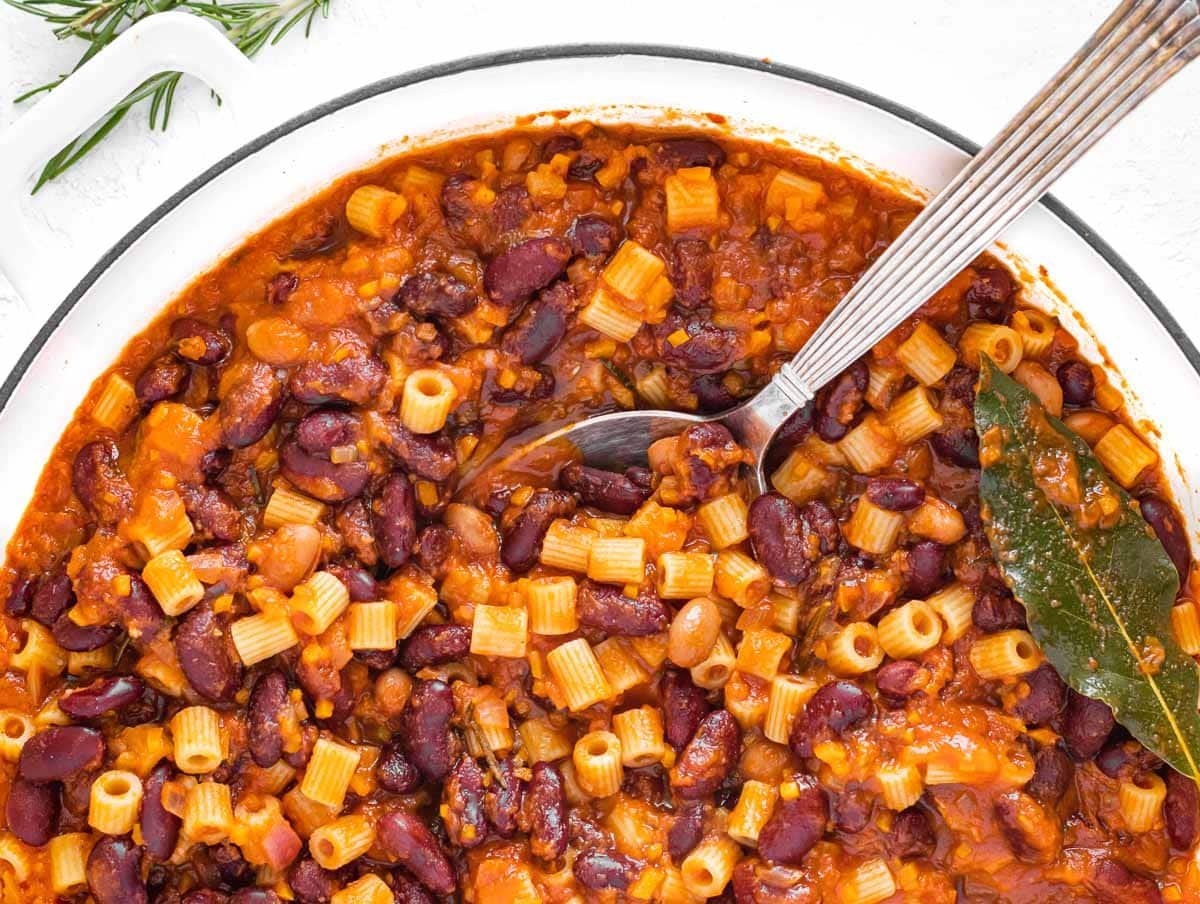 pasta fagioli in a white pot