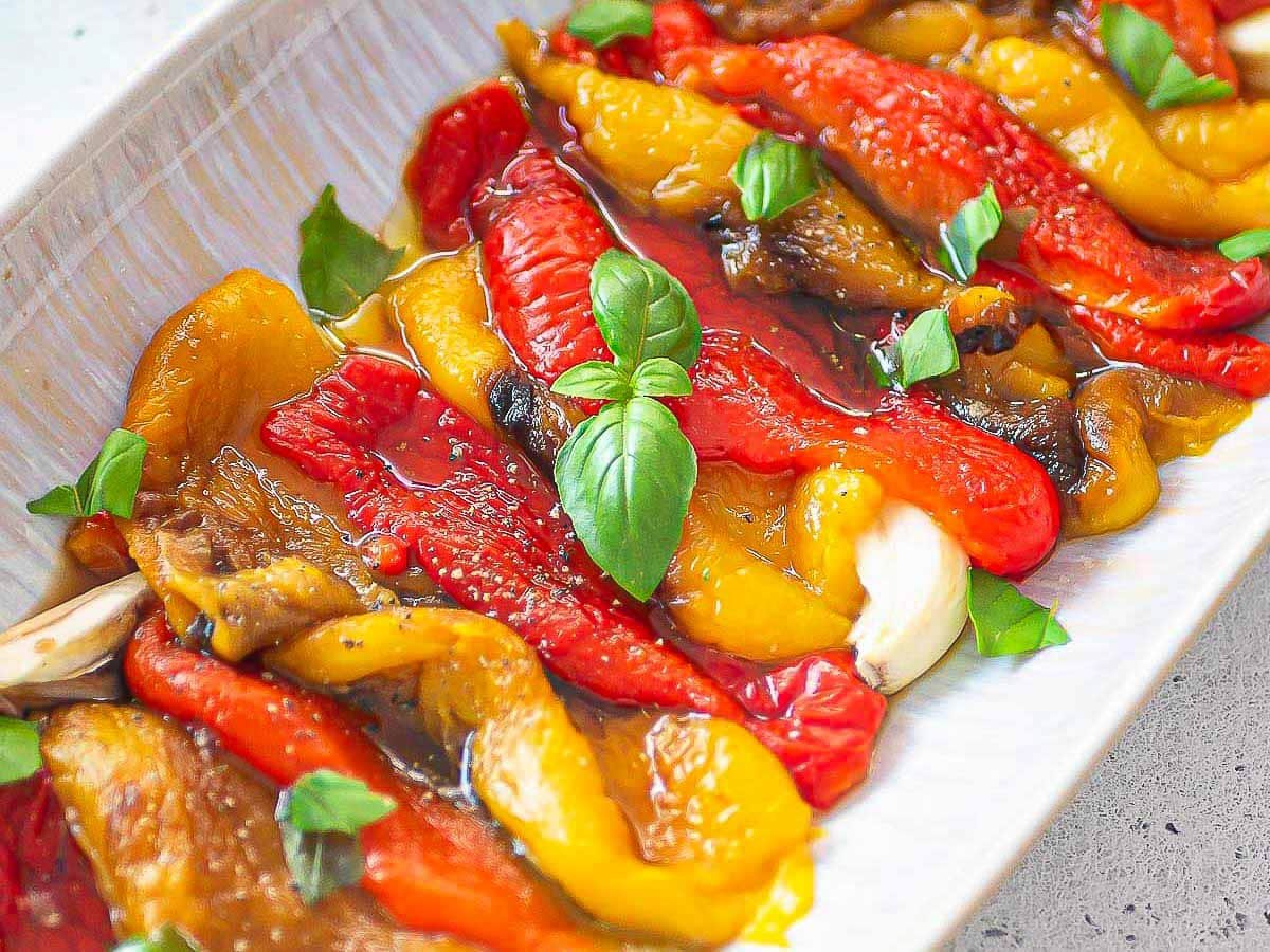 red and yellow bell peppers with basil