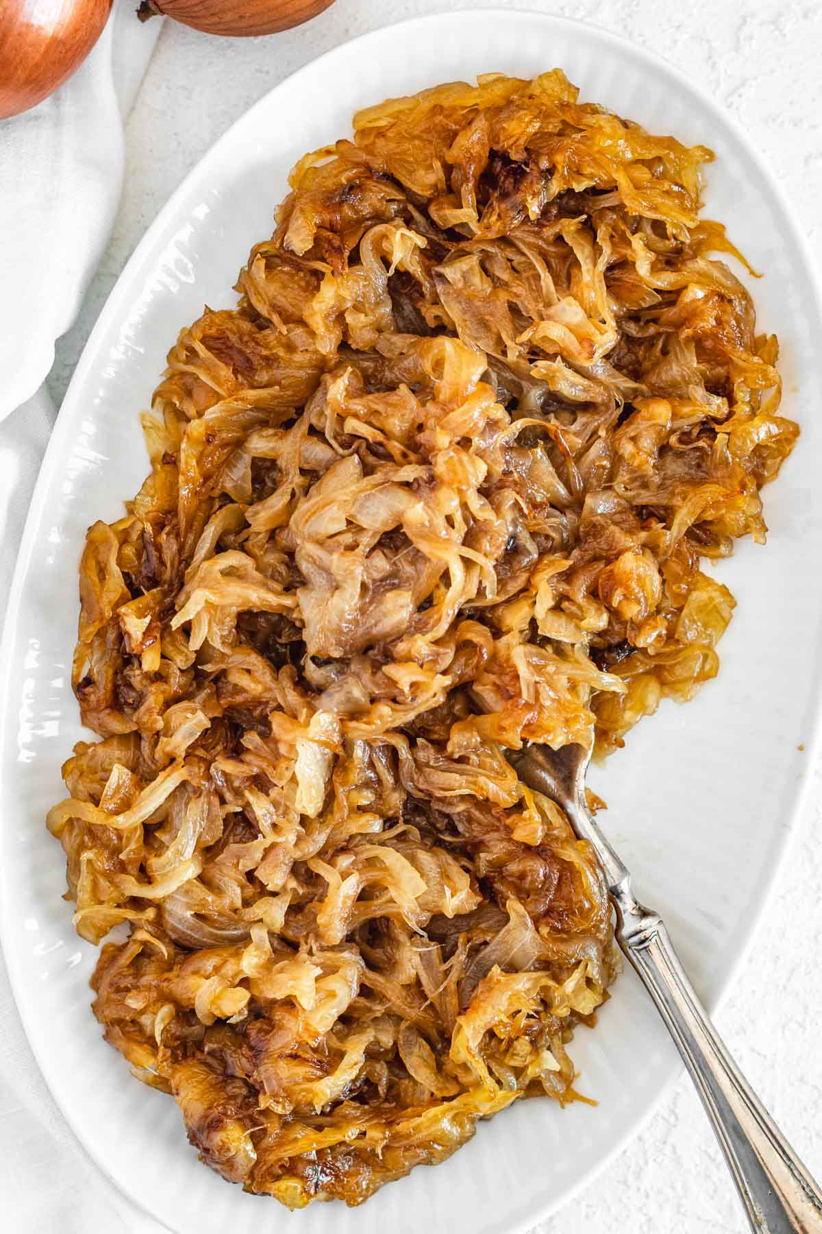 Caramelized onions on a white platter