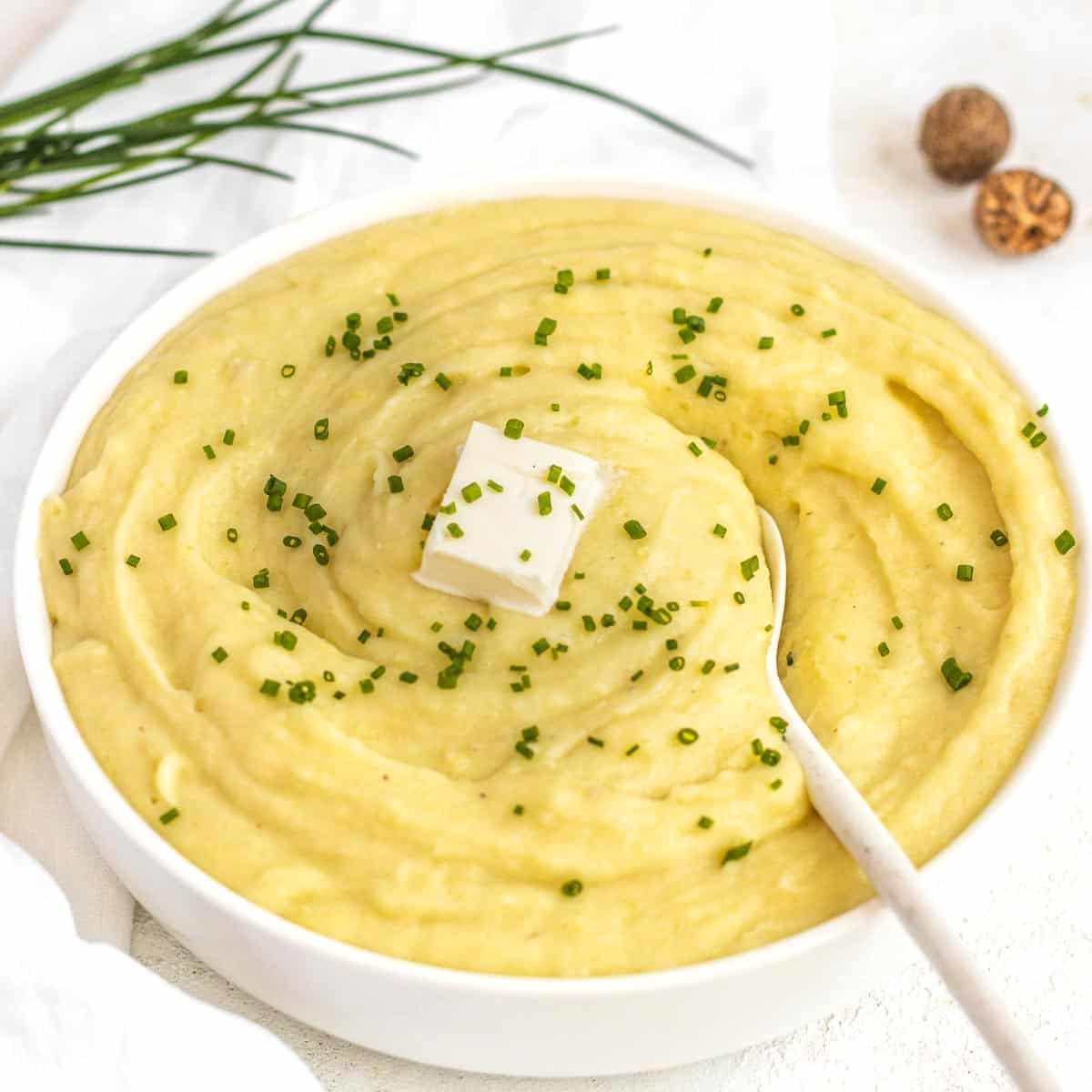Mashed potatoes with white spoon