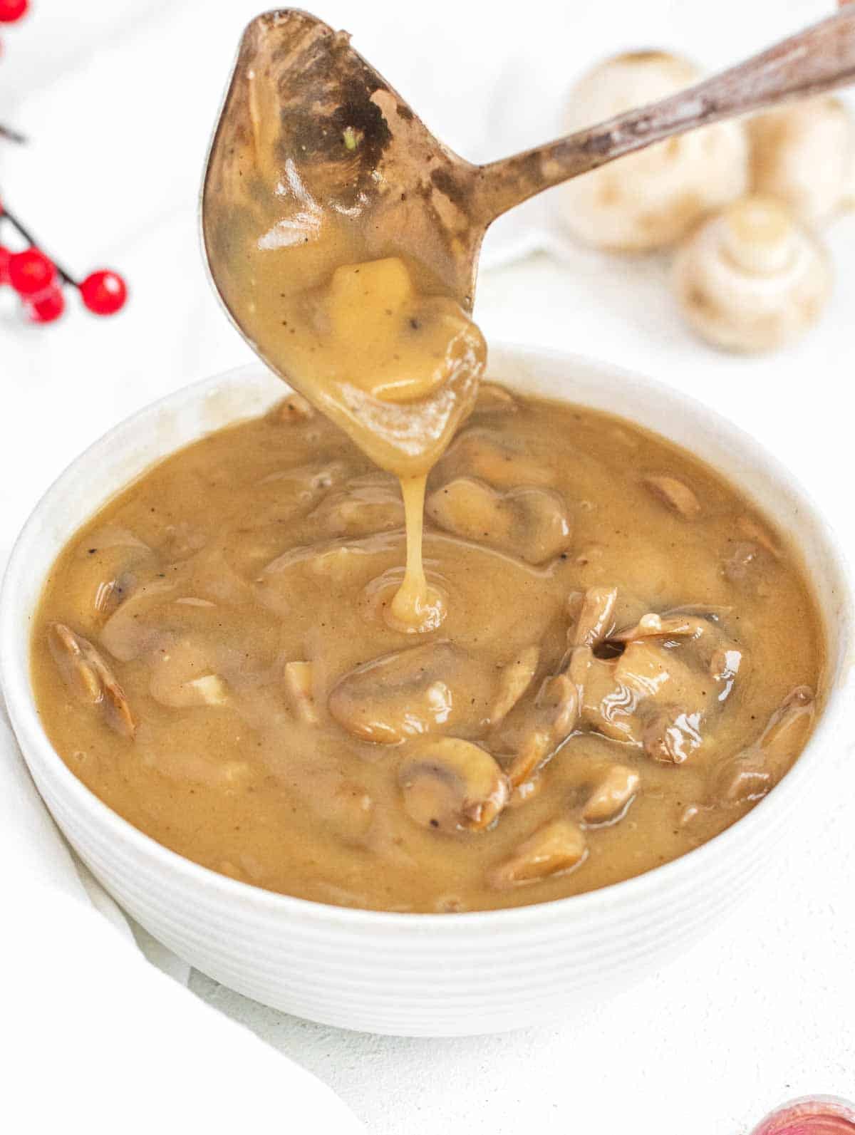 Mushroom gravy and sauce spoon