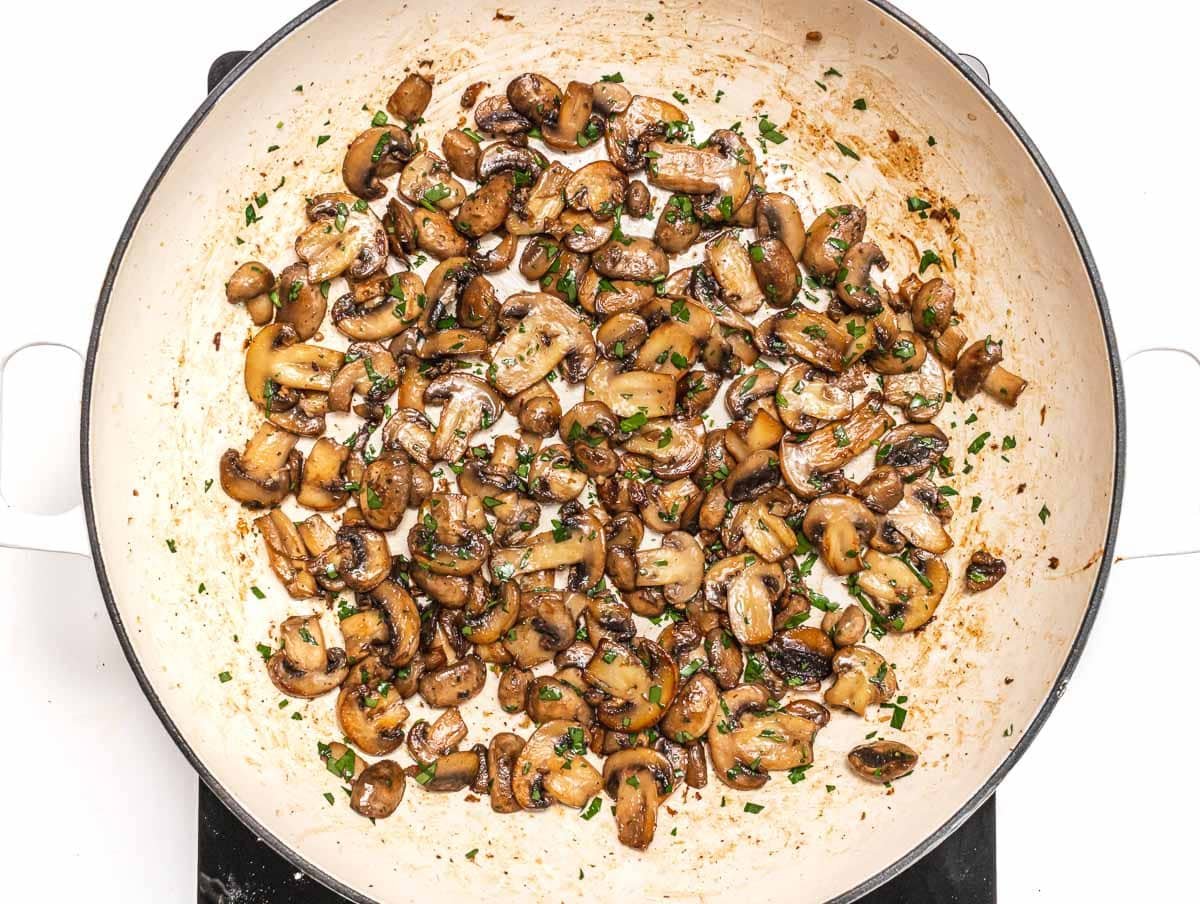 Sauteed mushrooms in a skillet