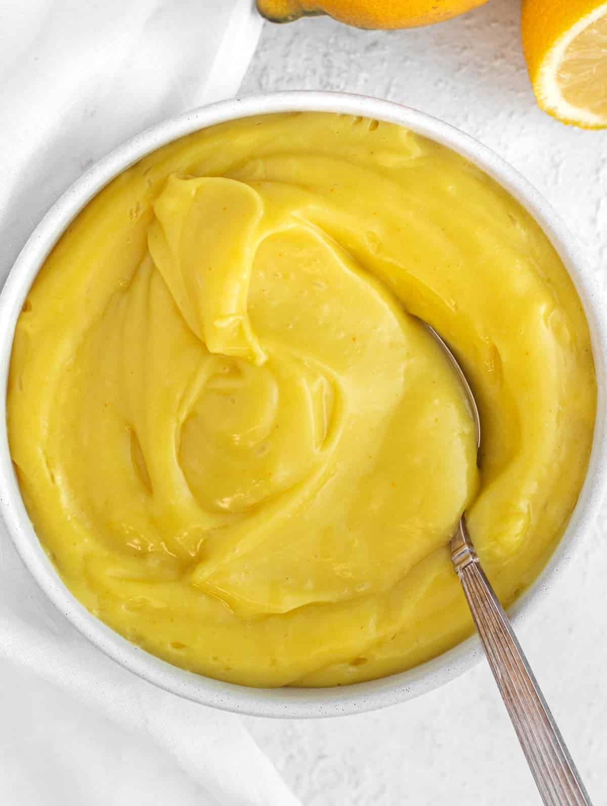 Vegan lemon curd with spoon